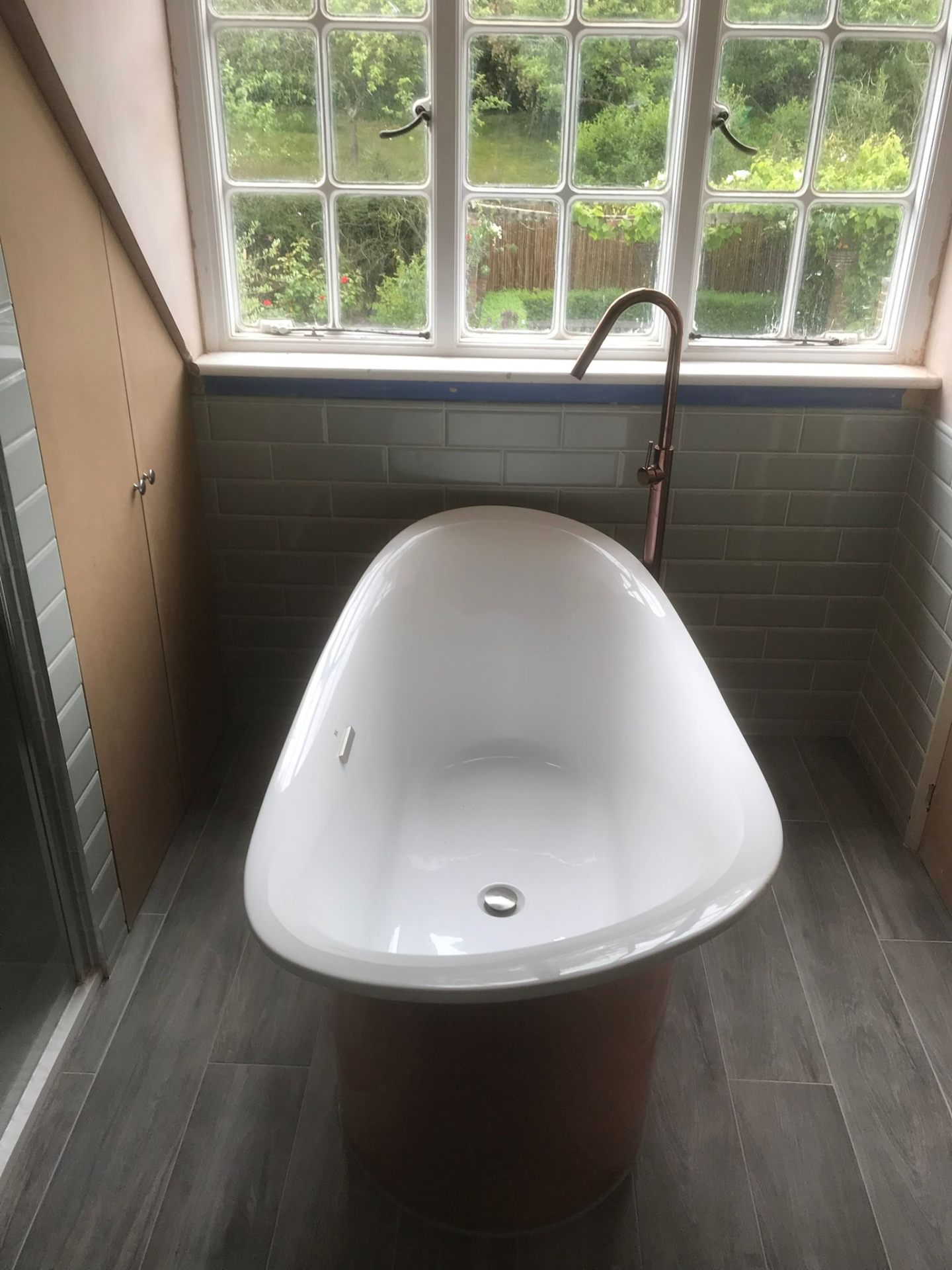 Freestanding Copper Bath — expert bathroom fitting by LUXE Bathrooms East Sussex